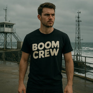 Lifestyle shot of the "Boom Crew" black storms t shirt in a real-world setting