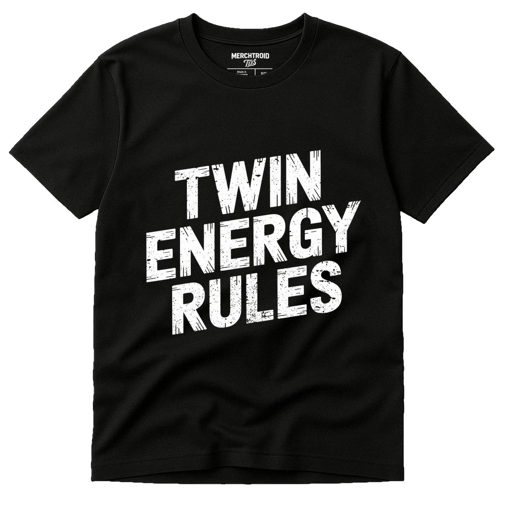 A black T-shirt with the text "TWIN ENERGY RULES" printed in bold, white, distressed letters on the front.