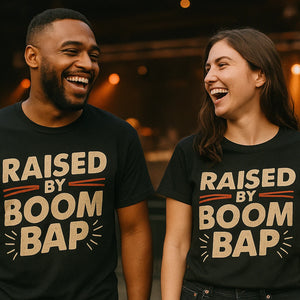 Person wearing the black hip hop tshirt graphic tee - "Raised By Boom Bap" design