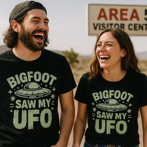 Person wearing the black alien tee shirts graphic tee - "Bigfoot Saw My UFO" design