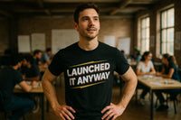 A person stands confidently with hands on hips, wearing a black shirt with the text 