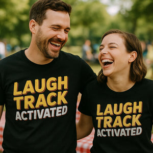 Person wearing the black daddy shirts graphic tee - "Laugh Track Activated" design
