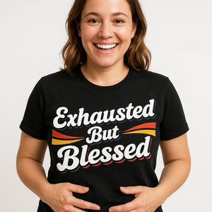 Close-up of the "Exhausted But Blessed" white print on a premium Bella+Canvas black mom life shirts