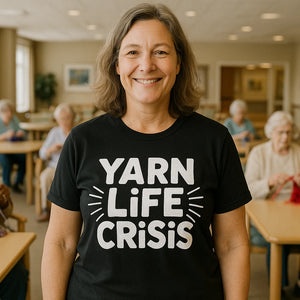 Lifestyle shot of the "Yarn Life Crisis" black mens knitted t shirt in a real-world setting