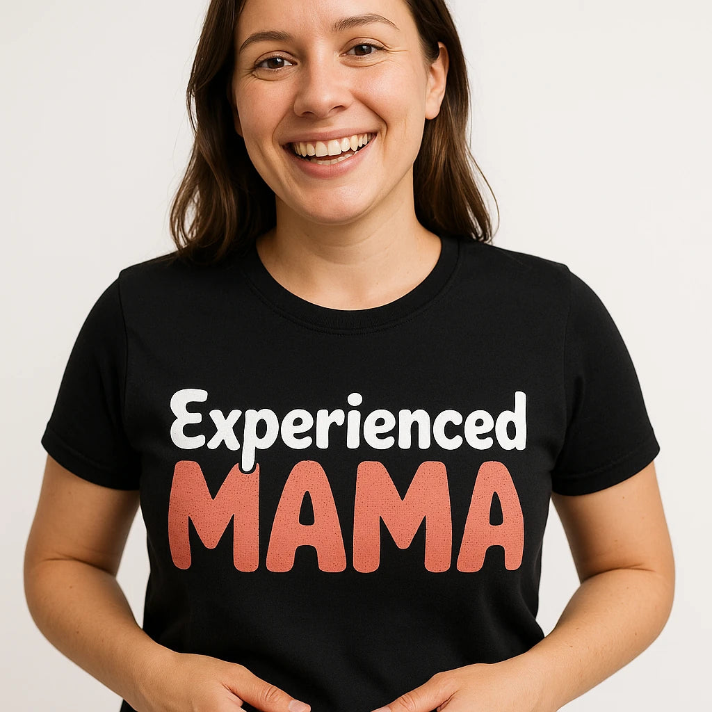Close-up of the "Experienced Mama" orange print on a premium Bella+Canvas black mom life bleached tee