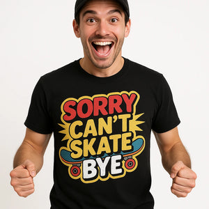 Close-up of the "Sorry Can'T Skate Bye" tan print on a premium Bella+Canvas black skateboard tees