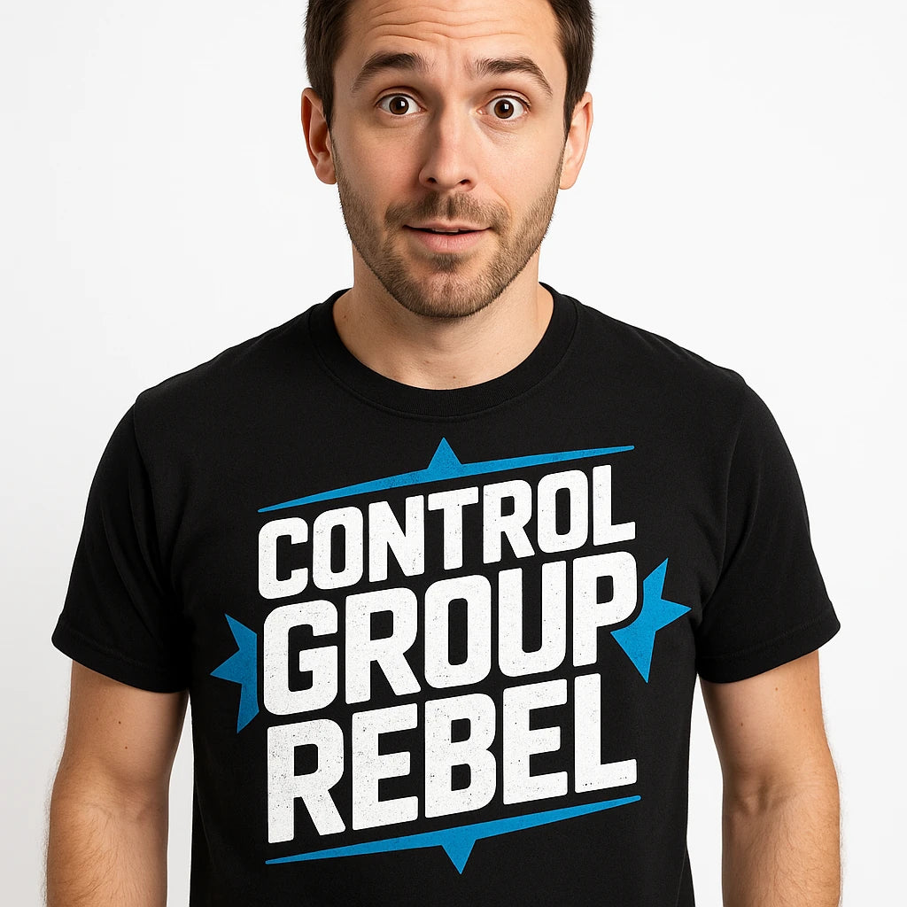 Close-up of the "Control Group Rebel" white print on a premium Bella+Canvas black scientist shirts