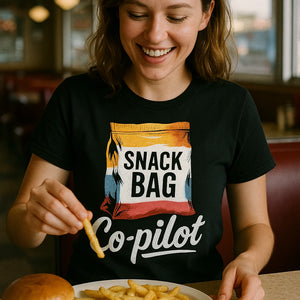 "Snack Bag Copilot" black road trip t shirt, photographed as gifts for road trip lovers