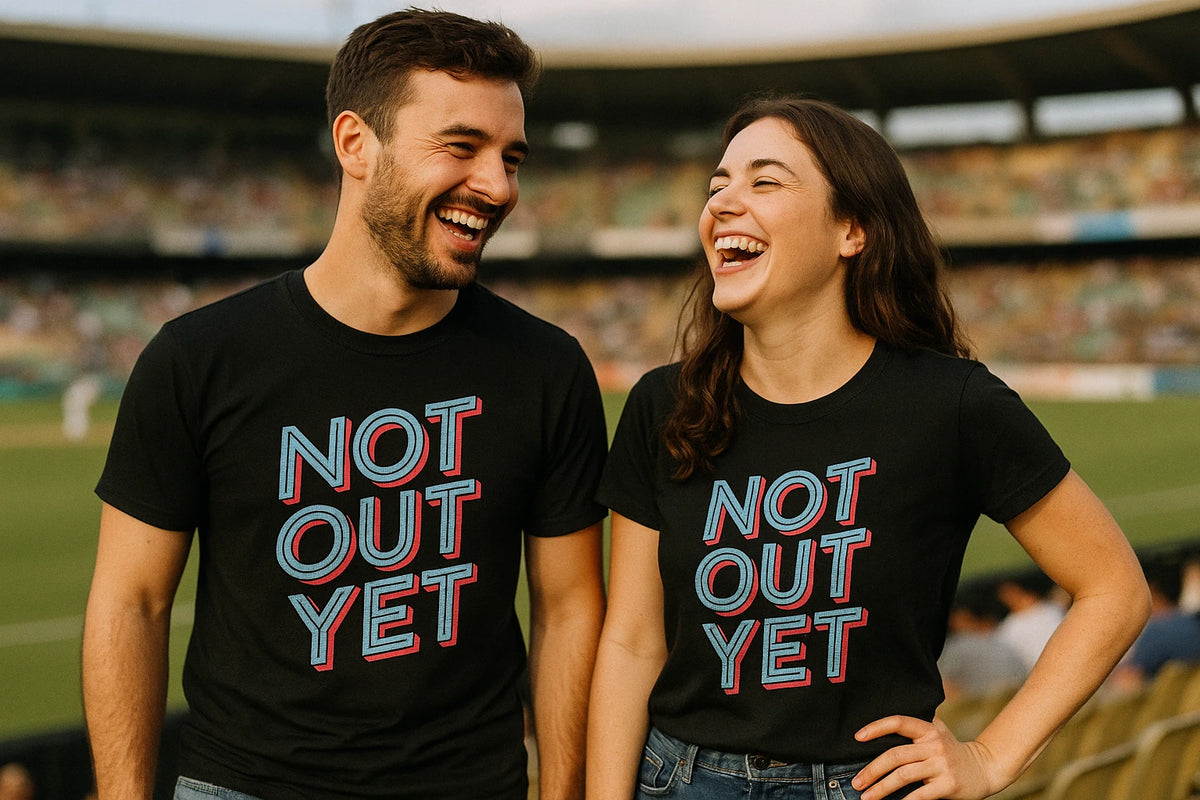 Person wearing the black cricket shirts graphic tee - "Not Out Yet" design