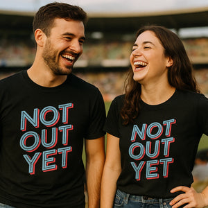Person wearing the black cricket shirts graphic tee - "Not Out Yet" design