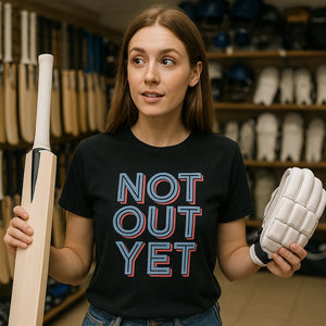 Lifestyle shot of the "Not Out Yet" black cricket shirts in a real-world setting