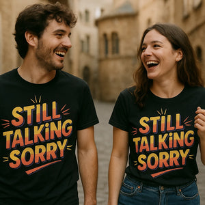 Person wearing the black personalized travel guide graphic tee - "Still Talking Sorry" design