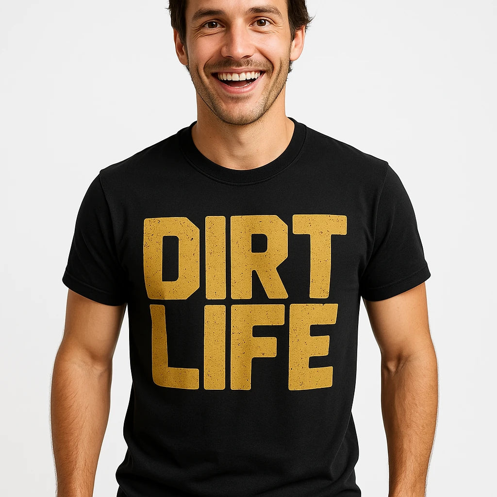 Close-up of the "Dirt Life" gold print on a premium Bella+Canvas black atv t shirt