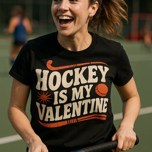 "Hockey Is My Valentine" black field hockey shirts, photographed as gifts for field hockey lovers