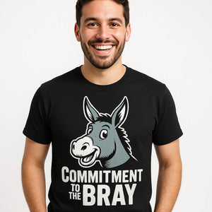 Close-up of the "Commitment To the Bray" white print on a premium Bella+Canvas black donkey tee shirts