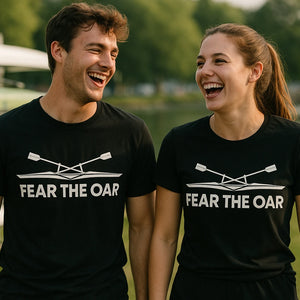 Person wearing the black t shirt rowing graphic tee - "Fear the Oar" design