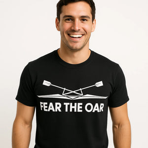 Close-up of the "Fear the Oar" white print on a premium Bella+Canvas black t shirt rowing