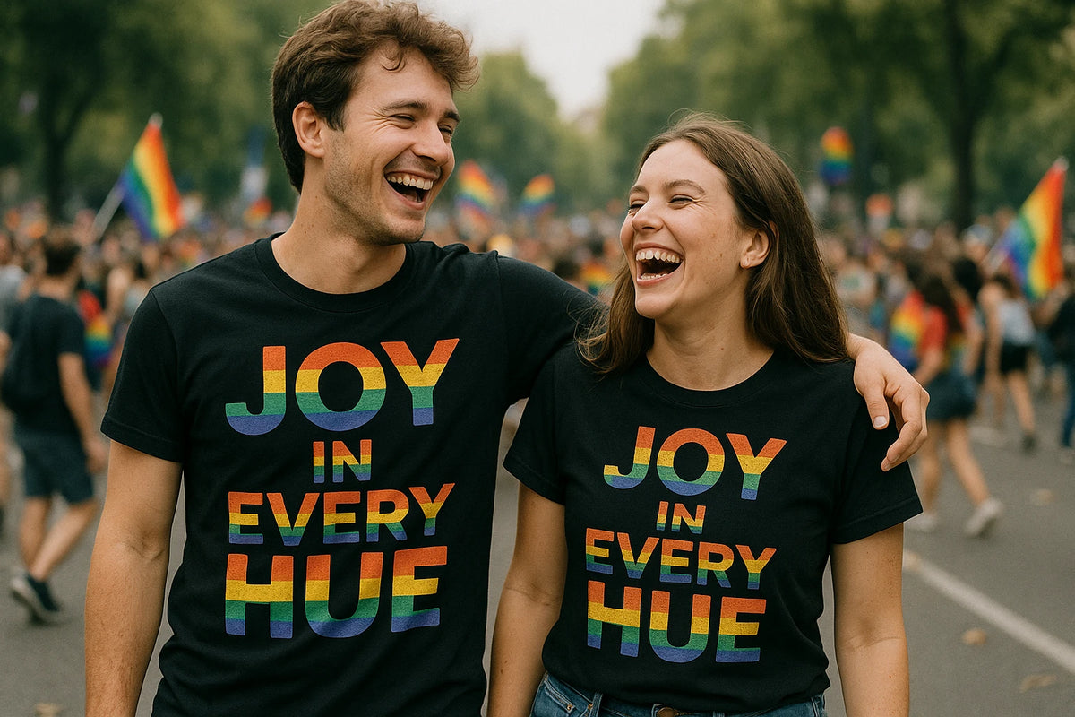Person wearing the black t shirt lgbtq graphic tee - "Joy in Every Hue" design