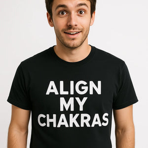 Close-up of the "Align My Chakras" white print on a premium Bella+Canvas black astrology t shirt