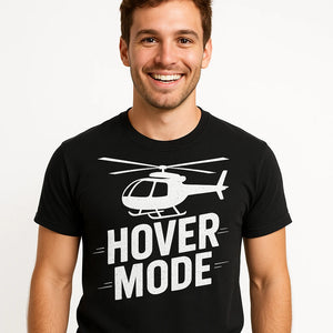 Close-up of the "Hover Mode" white print on a premium Bella+Canvas black helicopter shirts