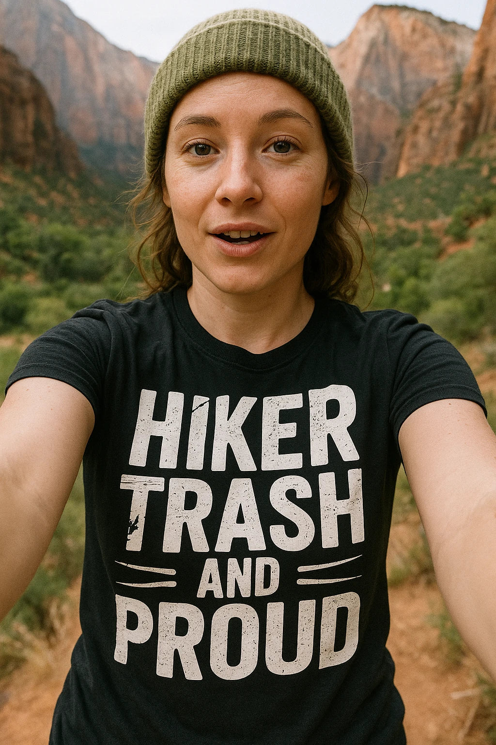 "Hiker Trash and Proud" black best backpacking shirts, photographed as backpacking lover gift