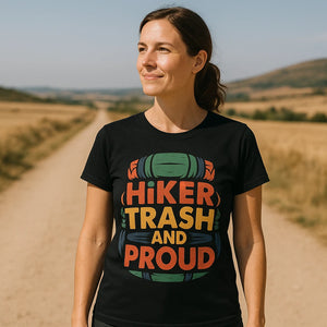 Lifestyle shot of the "Hiker Trash and Proud" black backpacking t shirt in a real-world setting