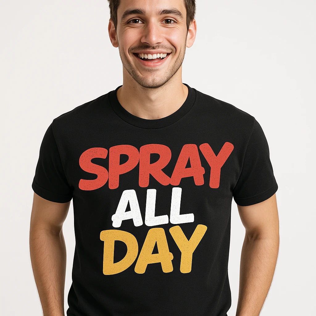 Close-up of the "Spray All Day" orange print on a premium Bella+Canvas black street art tee shirts