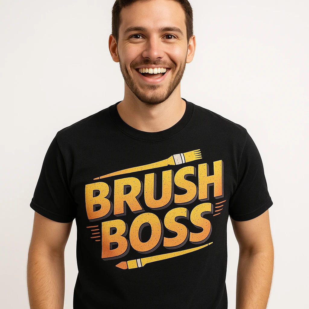 Close-up of the "Brush Boss" gold print on a premium Bella+Canvas black painting t shirt