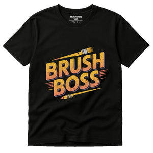 Black Painting T Shirt - "Brush Boss" graphic tee with gold print, flat lay product photo