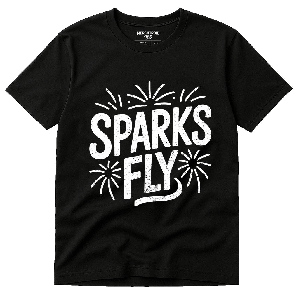 A black T-shirt with the text "SPARKS FLY" in bold white letters, surrounded by graphic illustrations of small fireworks.
