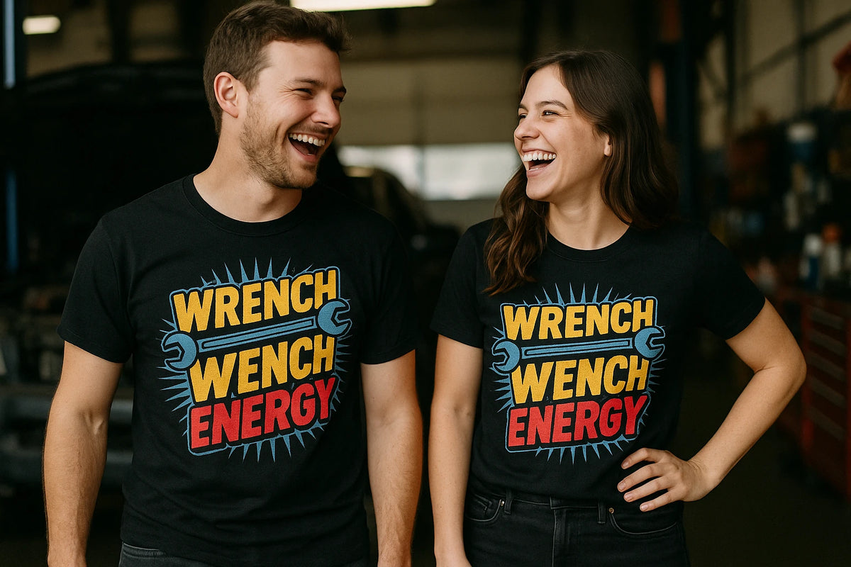 Person wearing the black mechanic shirts graphic tee - "Wrench Wench Energy" design
