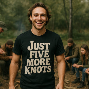 Lifestyle shot of the "Just Five More Knots" black bushcraft t shirt in a real-world setting