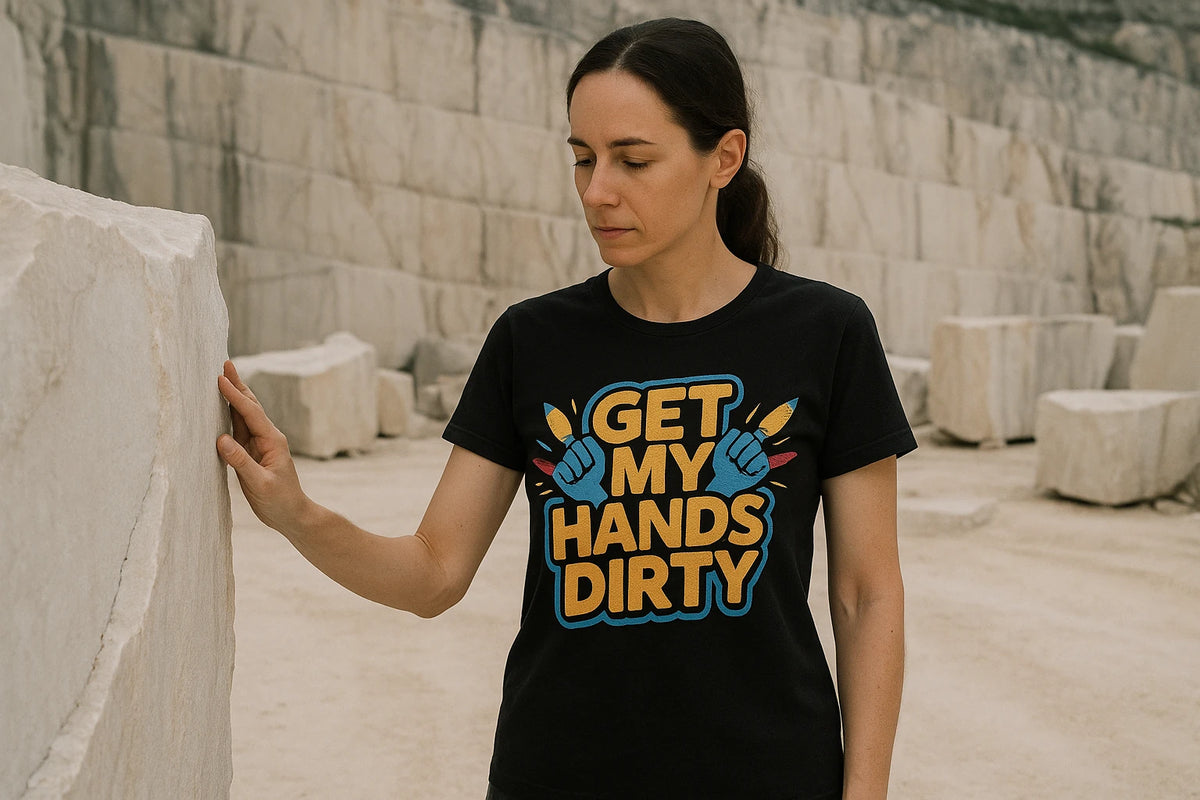 Lifestyle shot of the "Get My Hands Dirty" black sculpting t shirt in a real-world setting