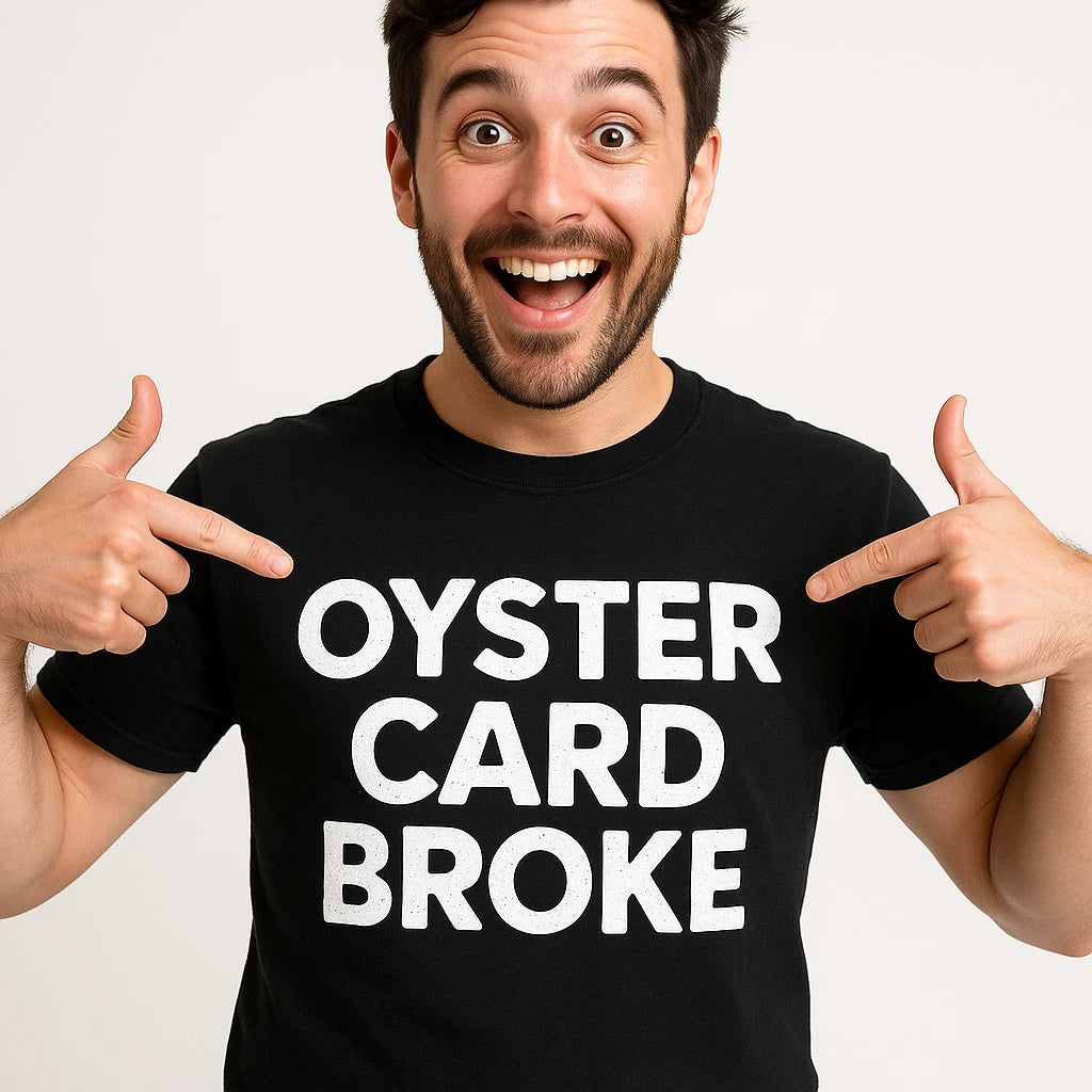 Close-up of the "Oyster Card Broke" white print on a premium Bella+Canvas black london t shirts uk