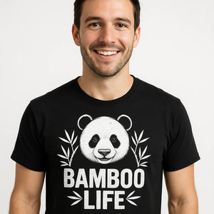 Close-up of the "Bamboo Life" white print on a premium Bella+Canvas black panda tee shirt