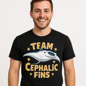 Close-up of the "Team Cephalic Fins" gold print on a premium Bella+Canvas black manta ray shirts