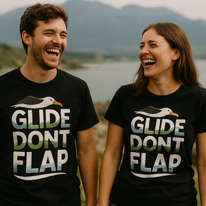 Person wearing the black albatross t shirt graphic tee - "Glide Dont Flap" design