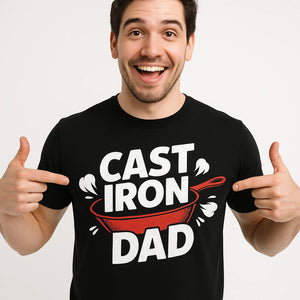 Close-up of the "Cast Iron Dad" white print on a premium Bella+Canvas black cooking t shirts funny