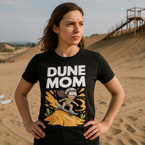 Lifestyle shot of the "Dune Mom" black sandboarding t shirt in a real-world setting