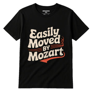 Black Classical Music Shirts - "Easily Moved By Mozart" graphic tee with cream print, flat lay product photo