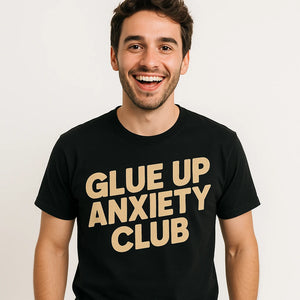 Close-up of the "Glue Up Anxiety Club" tan print on a premium Bella+Canvas black woodworking t shirts funny