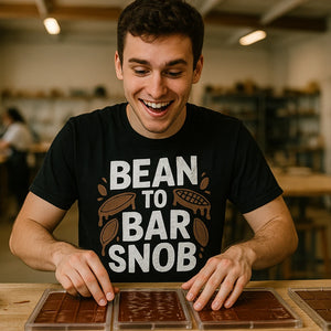 Lifestyle shot of the "Bean To Bar Snob" black chocolate t shirt in a real-world setting