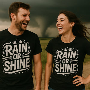Person wearing the black storms t shirt graphic tee - "Rain Or Shine" design