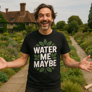 Lifestyle shot of the "Water Me Maybe" black botany t shirt in a real-world setting