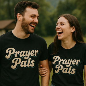 Person wearing the black faith over fear t shirt graphic tee - "Prayer Pals" design