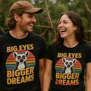 Person wearing the black lemur t shirt graphic tee - "Big Eyes Bigger Dreams" design