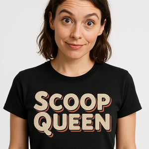 Close-up of the "Scoop Queen" beige print on a premium Bella+Canvas black journalist t shirt