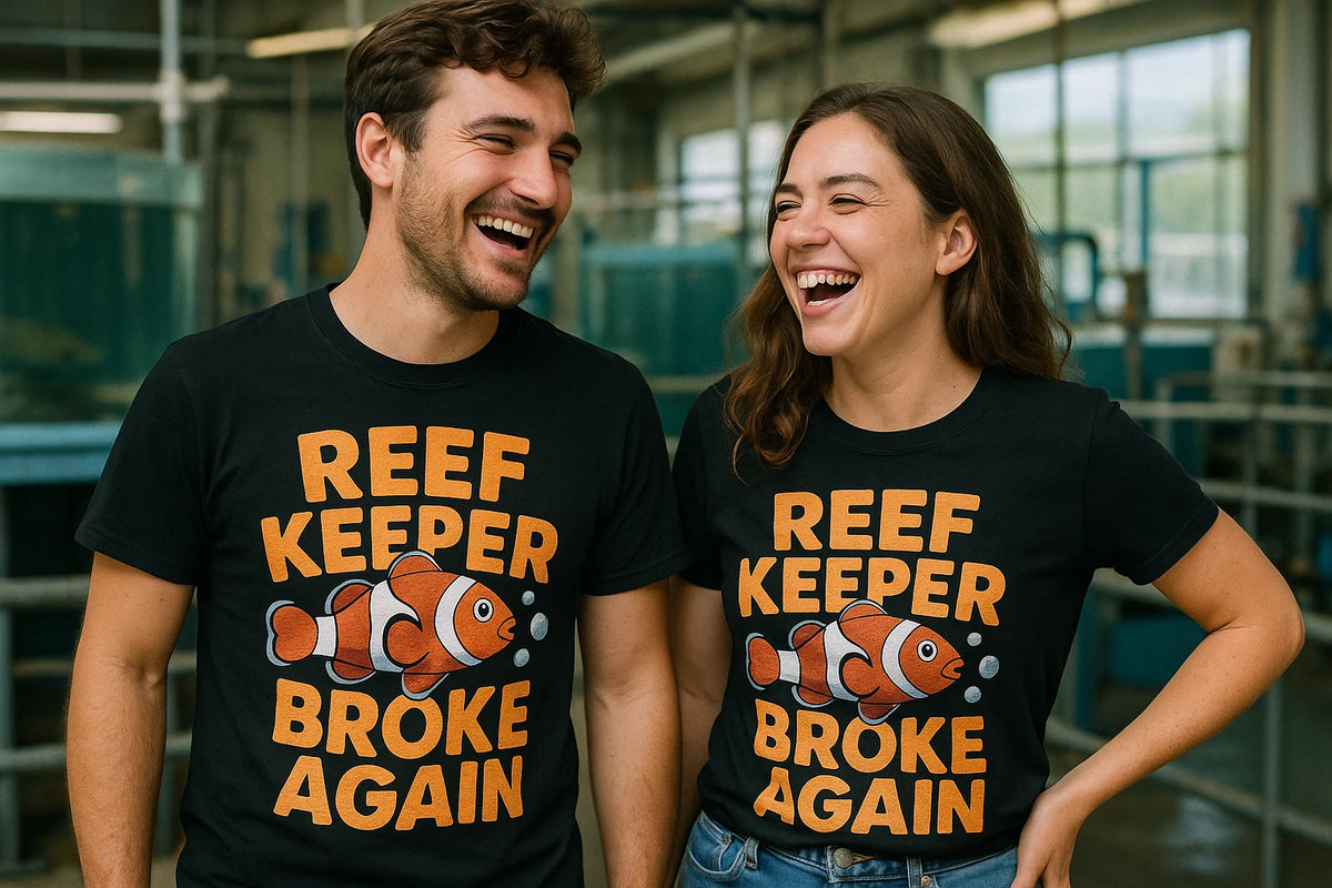 Person wearing the black clownfish shirts graphic tee - "Reef Keeper Broke Again" design