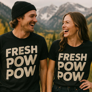 Person wearing the black skiing shirts graphic tee - "Fresh Pow Pow" design