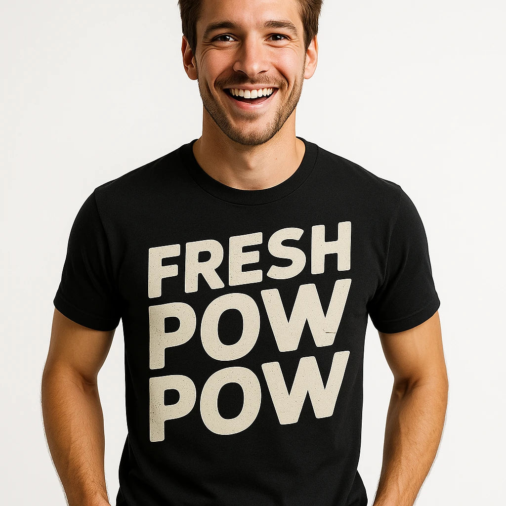 Close-up of the "Fresh Pow Pow" light gray print on a premium Bella+Canvas black skiing shirts